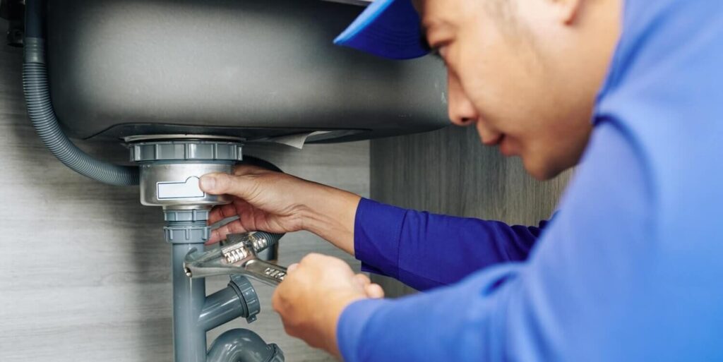 water pipe leak detection services professional plumber repairing a leaky drain