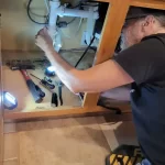 kitchen sink leaking underneath
